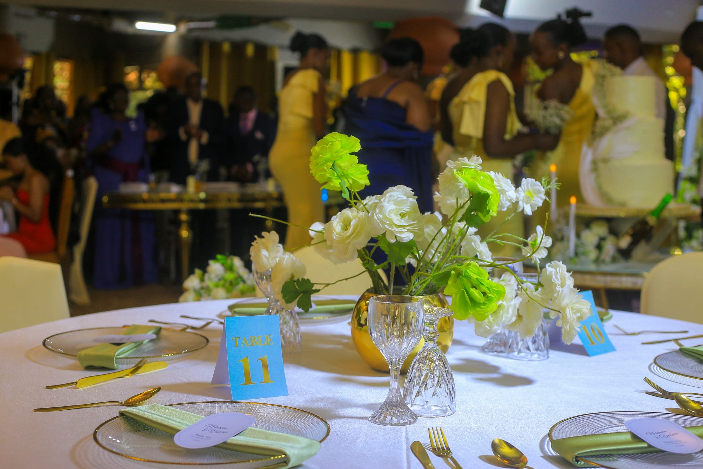 Ballroom reception dressed in green, white and gold